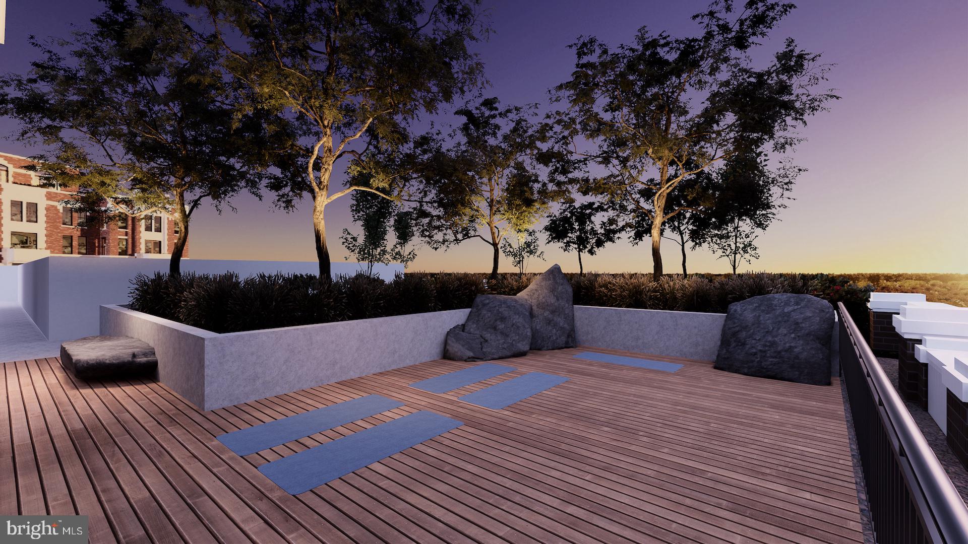 8551 Connecticut Avenue, Unit 411 Chevy Chase, MD 20815 - Photo 16 of 25 a view of balcony with furniture and potted plants