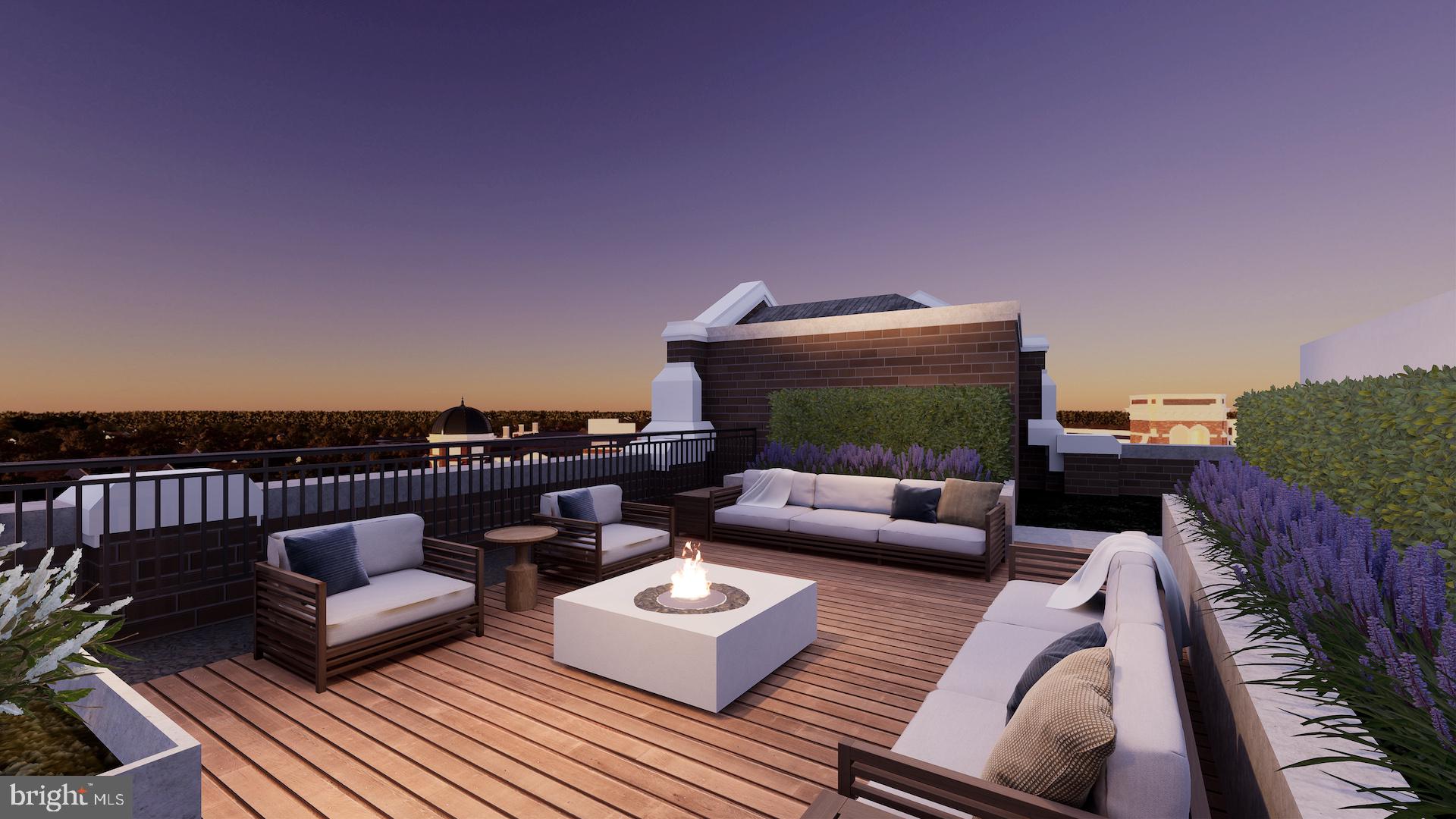 8551 Connecticut Avenue, Unit 411 Chevy Chase, MD 20815 - Photo 18 of 25 a view of a roof deck with couches and potted plants