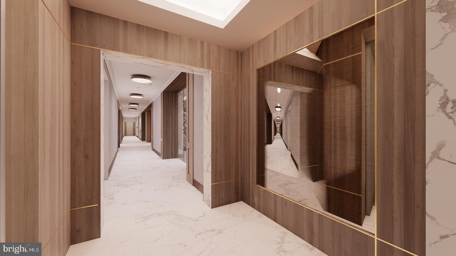 8551 Connecticut Avenue, Unit 411 Chevy Chase, MD 20815 - Photo 19 of 25 a view of hallway with wooden floor