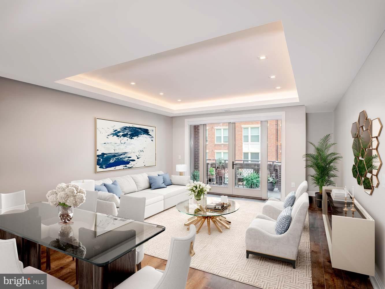 8551 Connecticut Avenue, Unit 411 Chevy Chase, MD 20815 - Photo 22 of 25 a living room with furniture and a large window