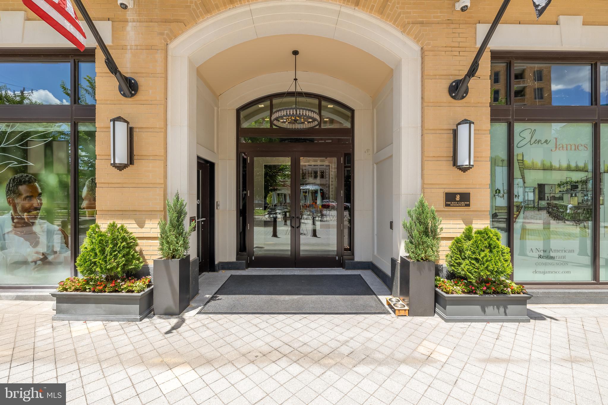 8551 Connecticut Avenue, Unit 411 Chevy Chase, MD 20815 - Photo 3 of 25 a view of a building with potted plants