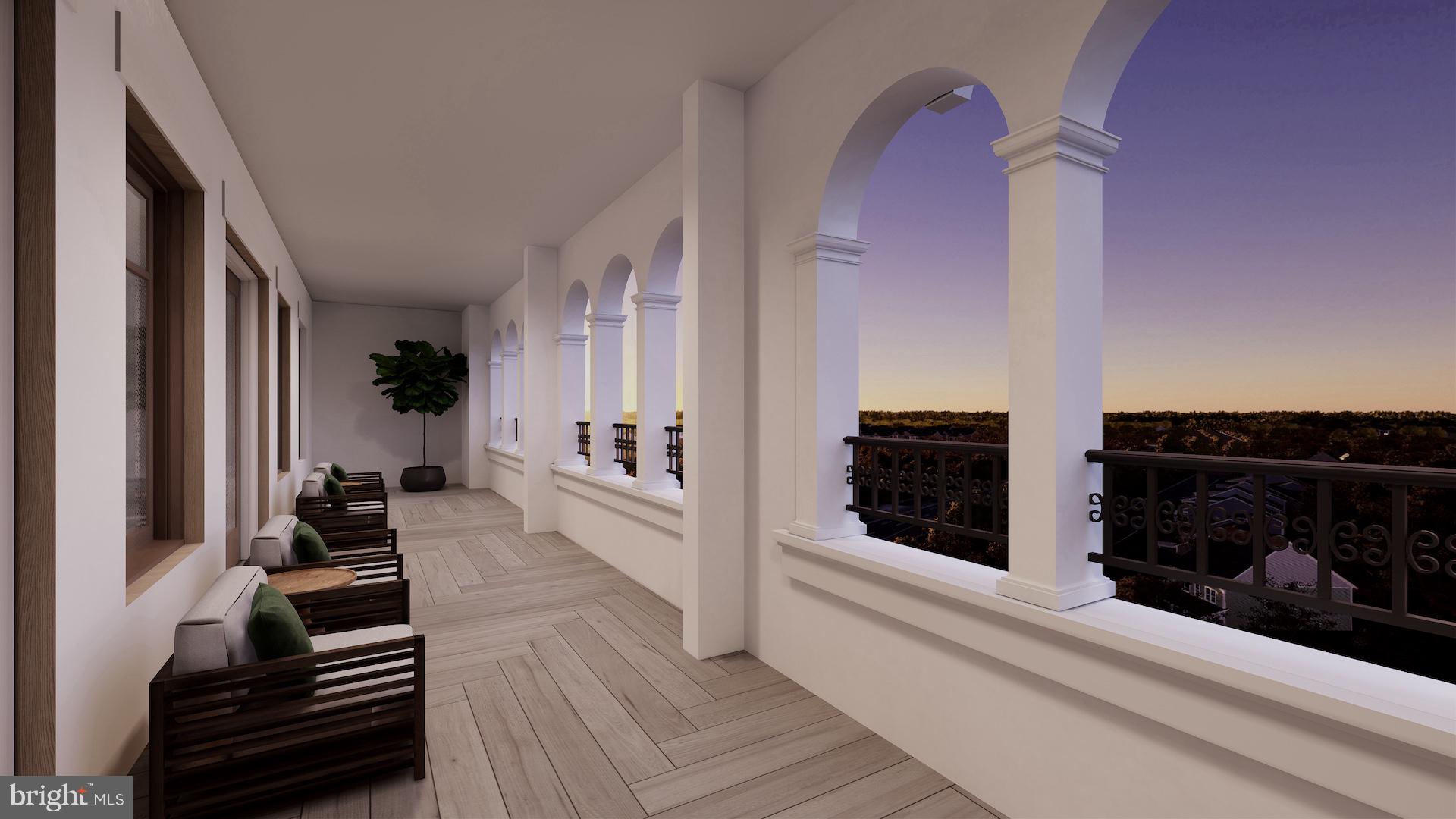 8551 Connecticut Avenue, Unit 411 Chevy Chase, MD 20815 - Photo 9 of 25 a view of a living room with furniture and wooden floor