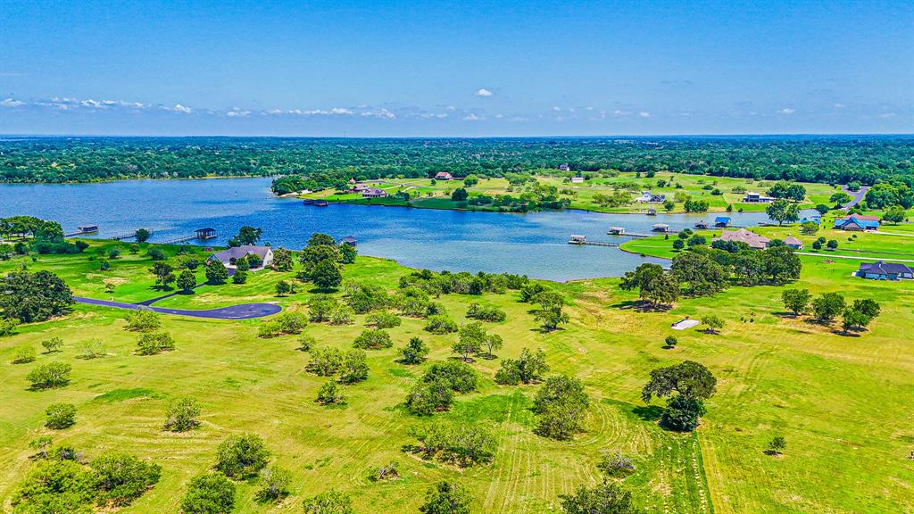 L77 R Moonlight Bay Court Streetman, TX 75859 - Photo 21 of 30 a view of a garden