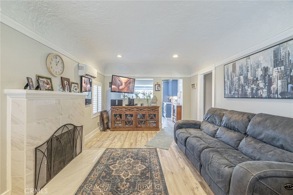 2548 East Washington Street Carson, CA 90810 - Photo 22 of 44 a living room with furniture and a couch