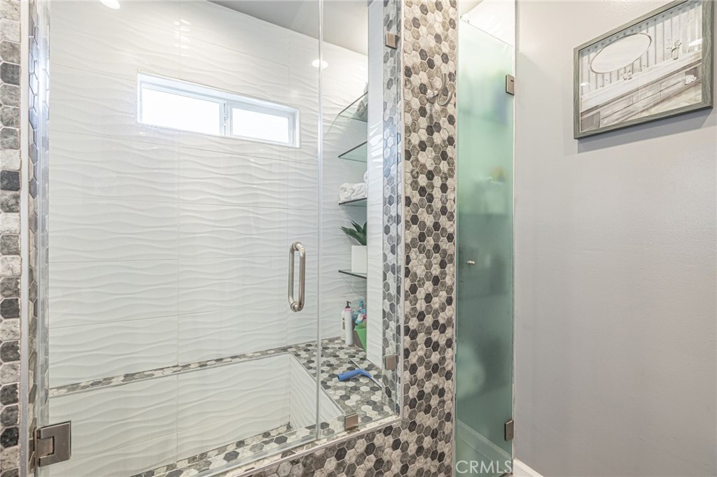 2548 East Washington Street Carson, CA 90810 - Photo 33 of 44 a bathroom with a shower