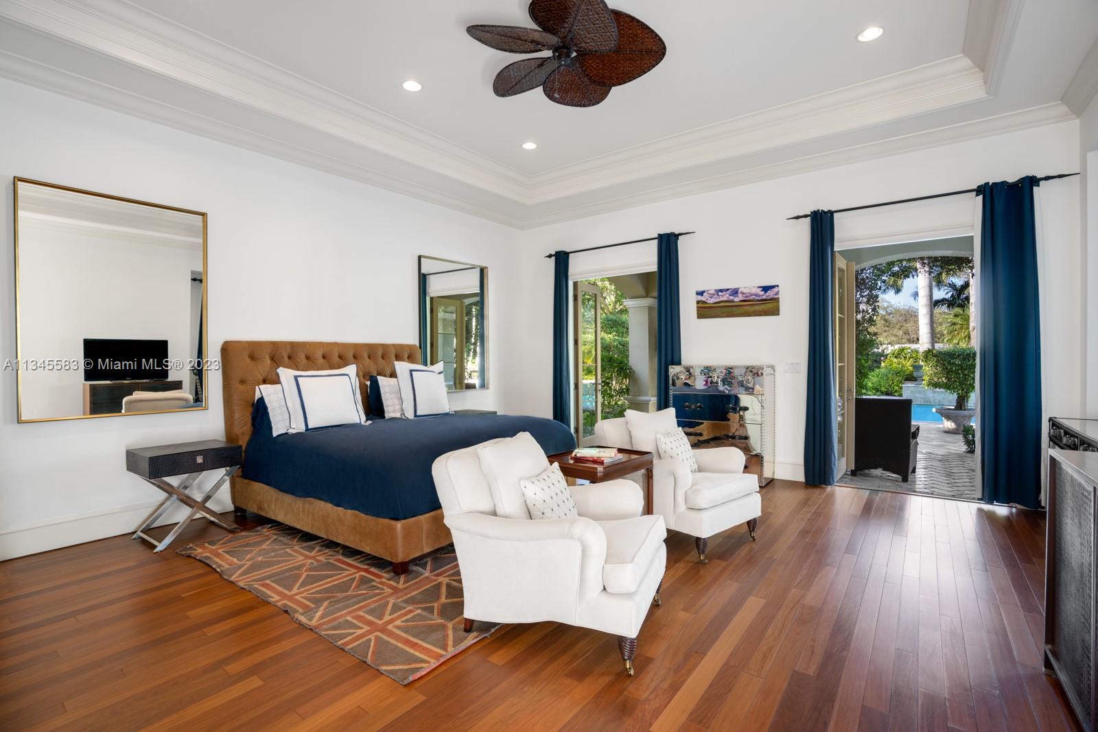 5001 Pine Drive Miami, FL 33143 - Photo 11 of 32 a living room with furniture and a fireplace
