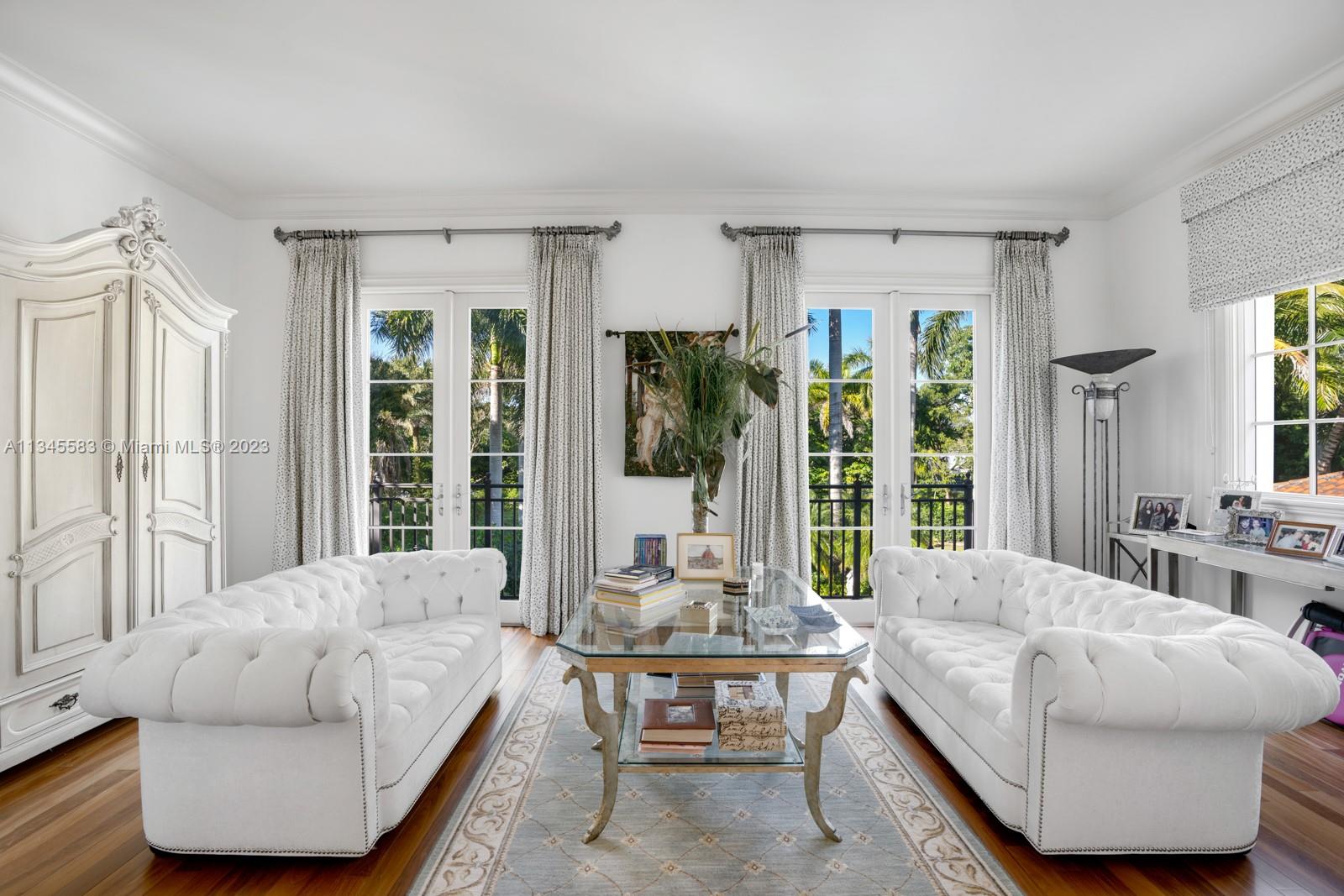5001 Pine Drive Miami, FL 33143 - Photo 13 of 32 a living room with furniture and a large window