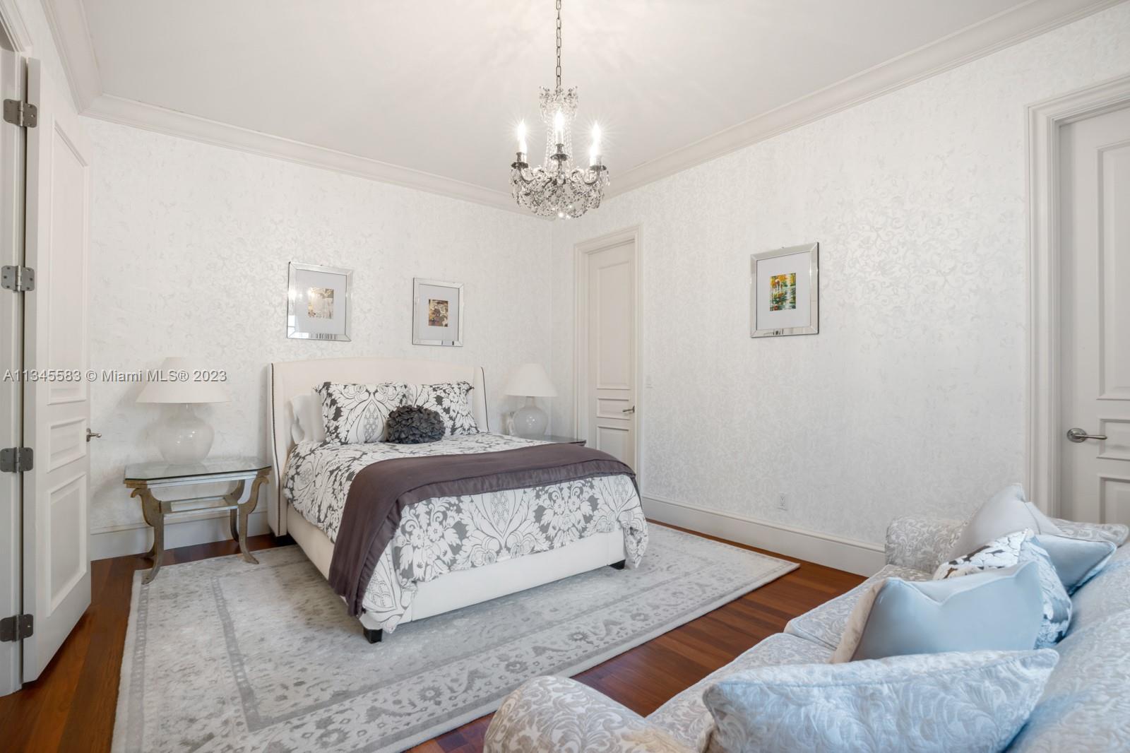 5001 Pine Drive Miami, FL 33143 - Photo 18 of 32 a bed room with a bed and a couch