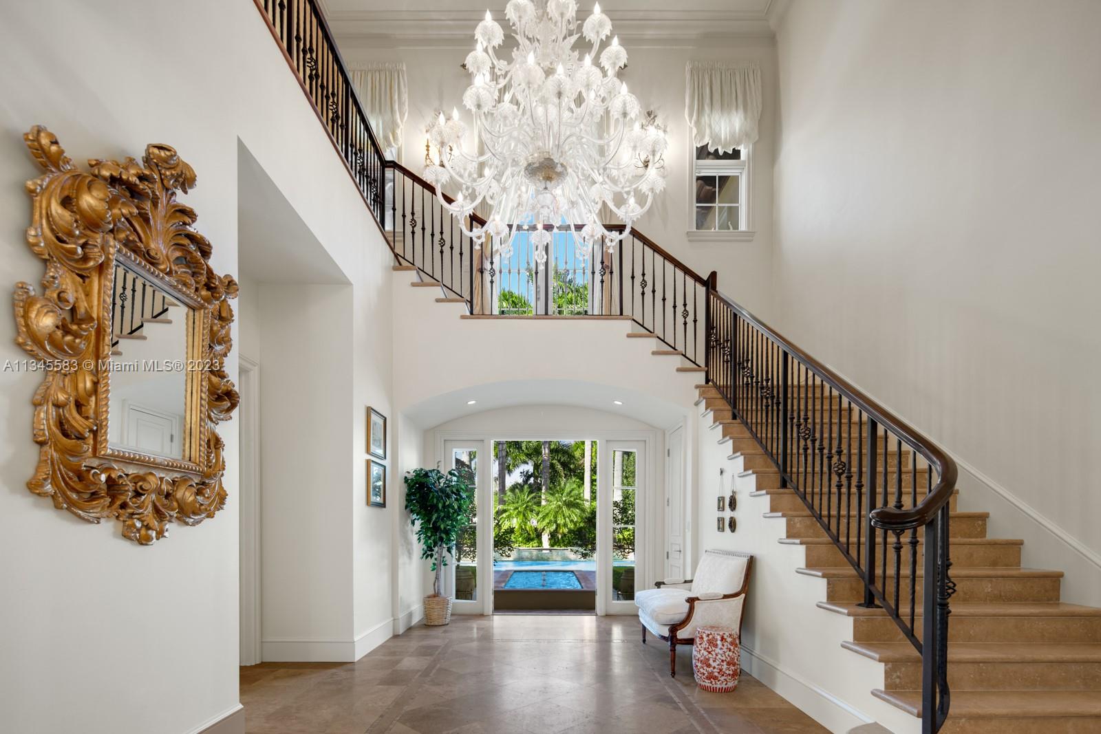 5001 Pine Drive Miami, FL 33143 - Photo 3 of 32 a view of entryway and hall with wooden floor