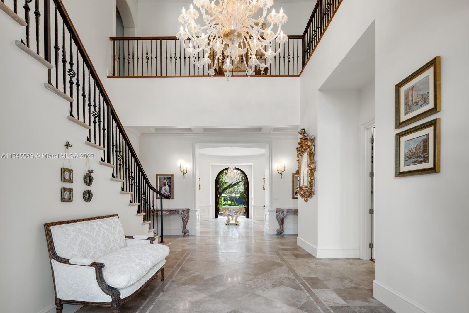 5001 Pine Drive Miami, FL 33143 - Photo 4 of 32 a view of entryway and hall with wooden floor