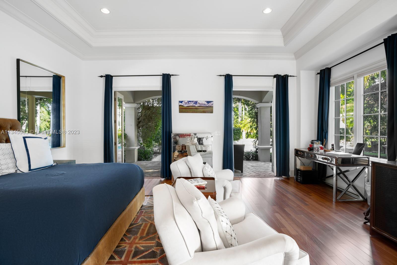 5001 Pine Drive Miami, FL 33143 - Photo 10 of 32 a living room with furniture and a large window