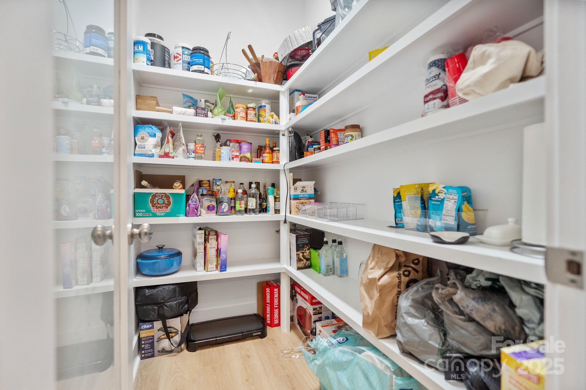 2075 Masons Bend Drive Fort Mill, SC 29708 - Photo 12 of 47 a utility room with stainless steel appliances lots of clutter and baby