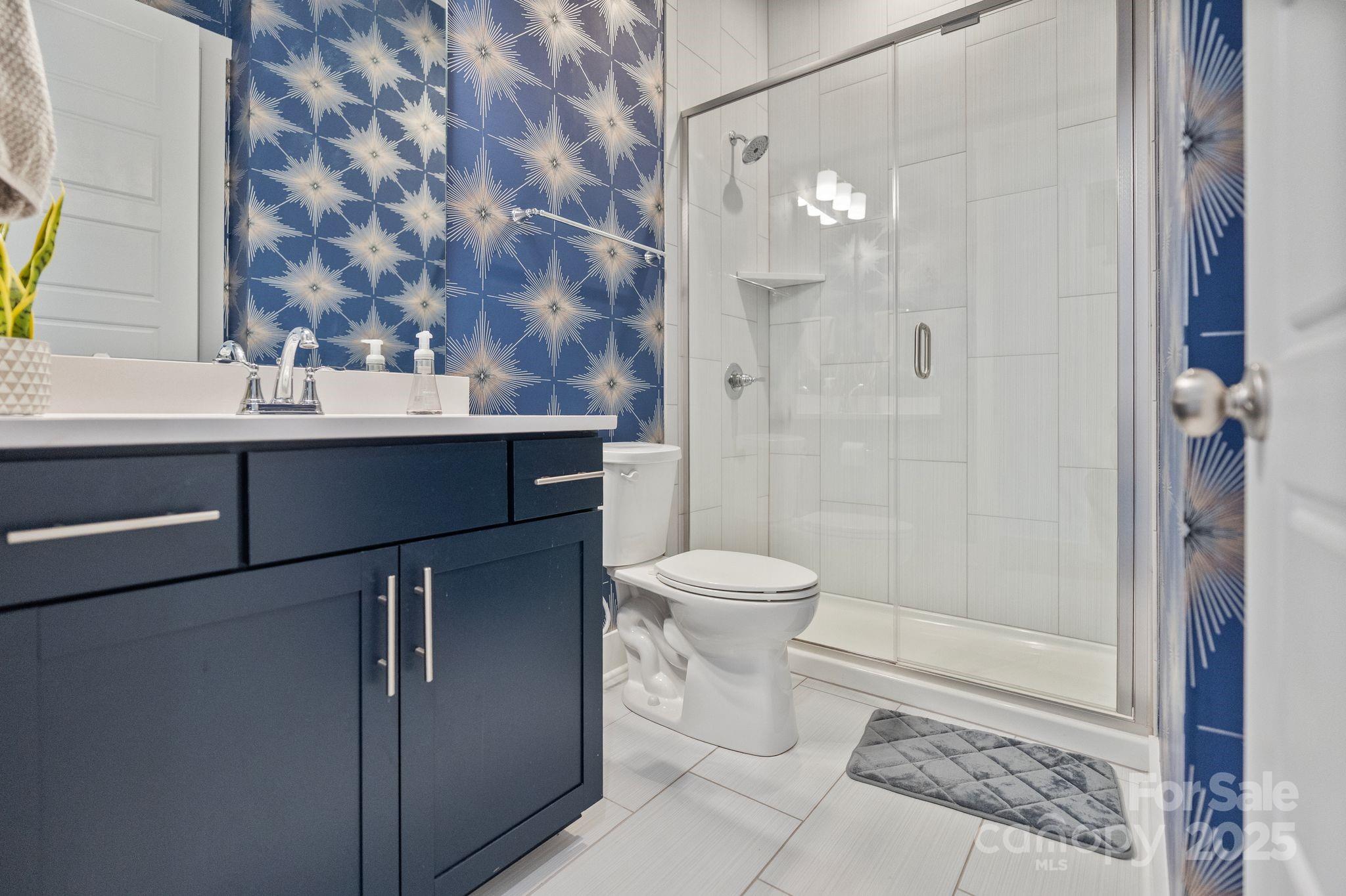 2075 Masons Bend Drive Fort Mill, SC 29708 - Photo 18 of 47 a bathroom with a sink toilet and shower