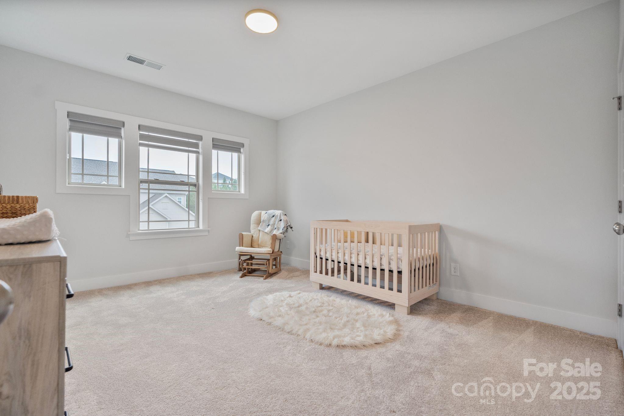 2075 Masons Bend Drive Fort Mill, SC 29708 - Photo 31 of 47 a room with a bed and a window