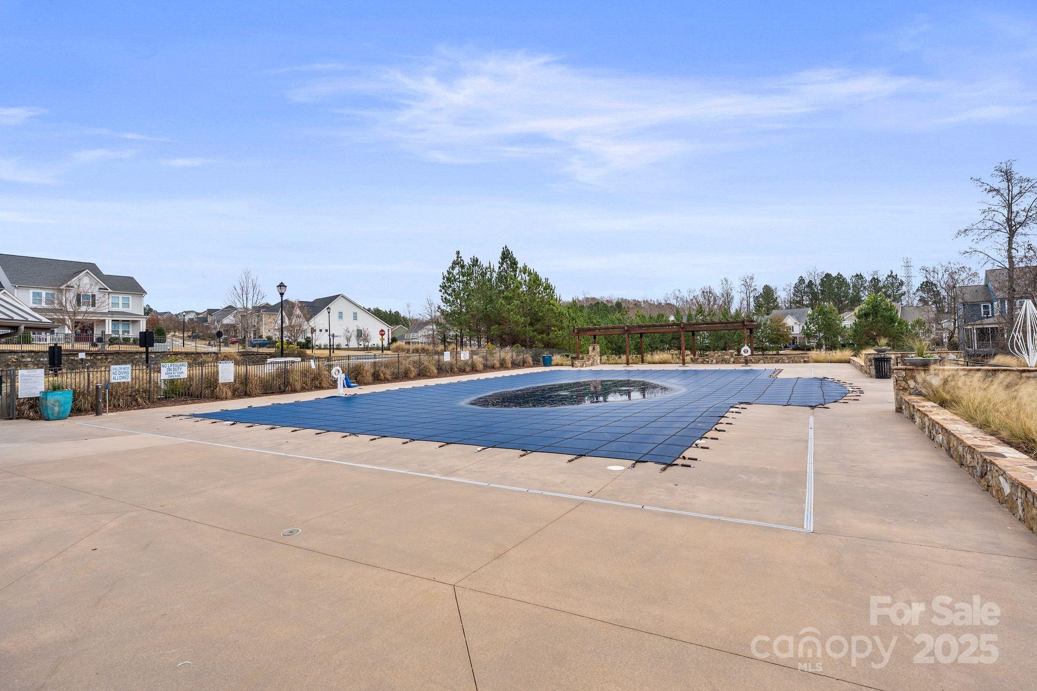 2075 Masons Bend Drive Fort Mill, SC 29708 - Photo 41 of 47 a view of swimming pool outdoor seating and city view