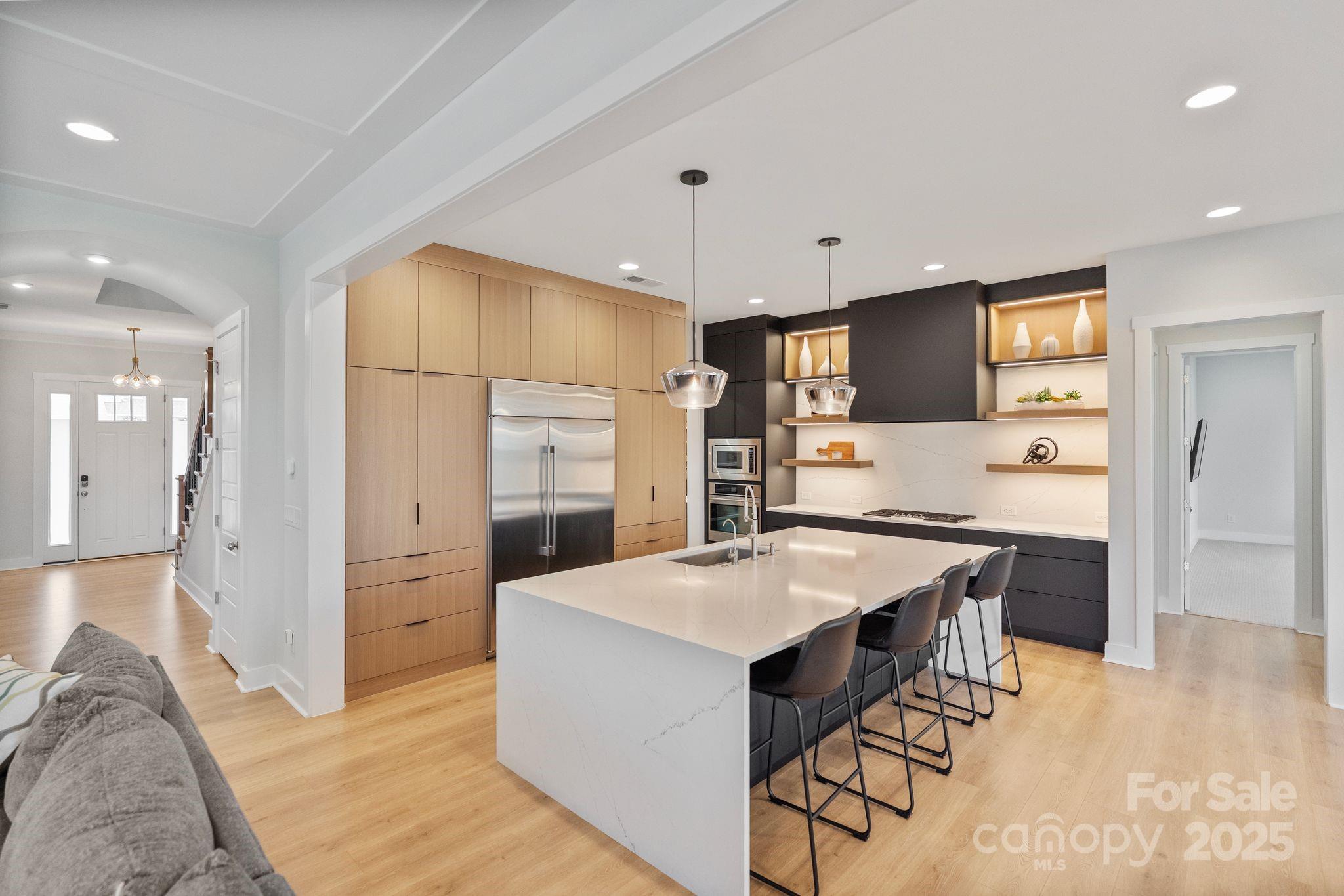 2075 Masons Bend Drive Fort Mill, SC 29708 - Photo 8 of 47 a large kitchen with a large counter top appliances and cabinets