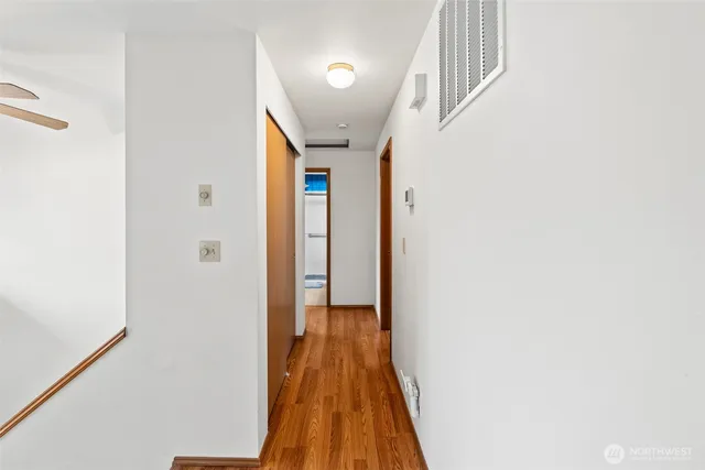 a bedroom with bed and a dresser