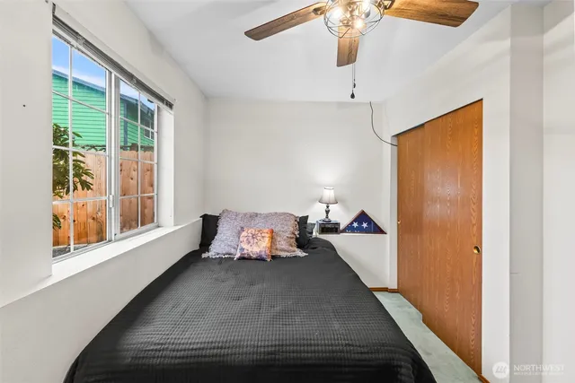a bed room with a bed and a walk in closet