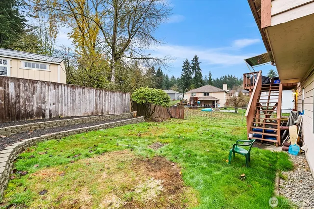 a view of a wooden fence