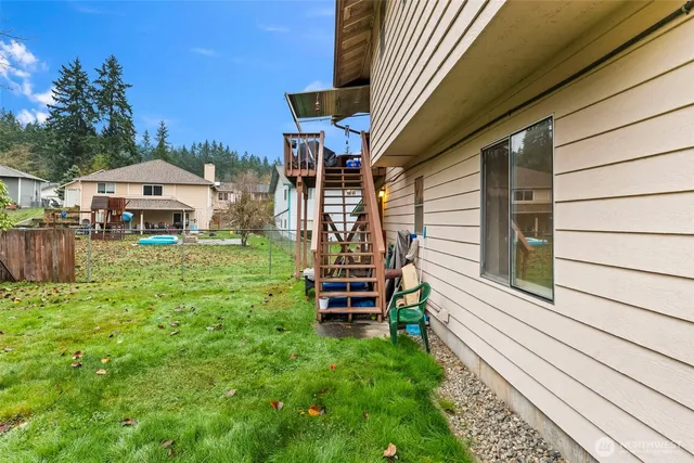 a view of yard and swimming pool