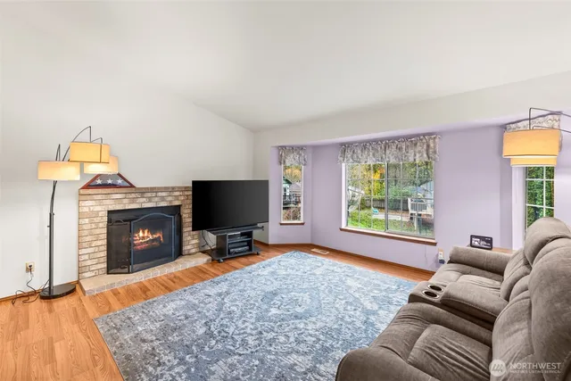 a kitchen that has a sink and a stove in it