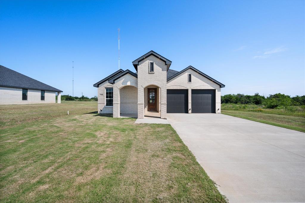 3400 Dobbins Road Corsicana, TX 75110 - Photo 40 of 40 a front view of a house with a yard