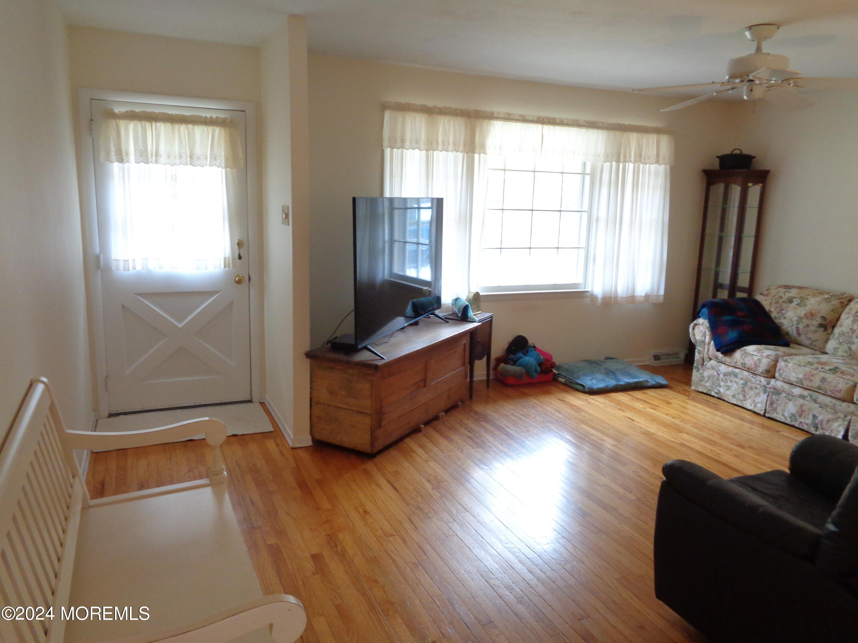401 Springfield Avenue Pine Beach, NJ 08741 - Photo 11 of 24 a living room with furniture and a window