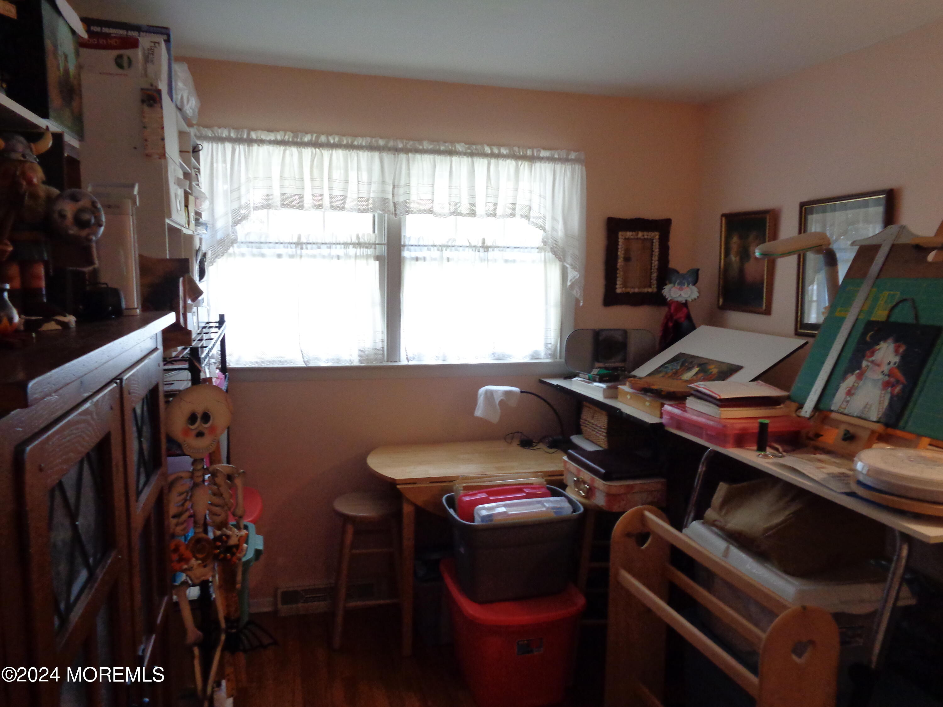 401 Springfield Avenue Pine Beach, NJ 08741 - Photo 13 of 24 a view of a workspace with furniture and a window