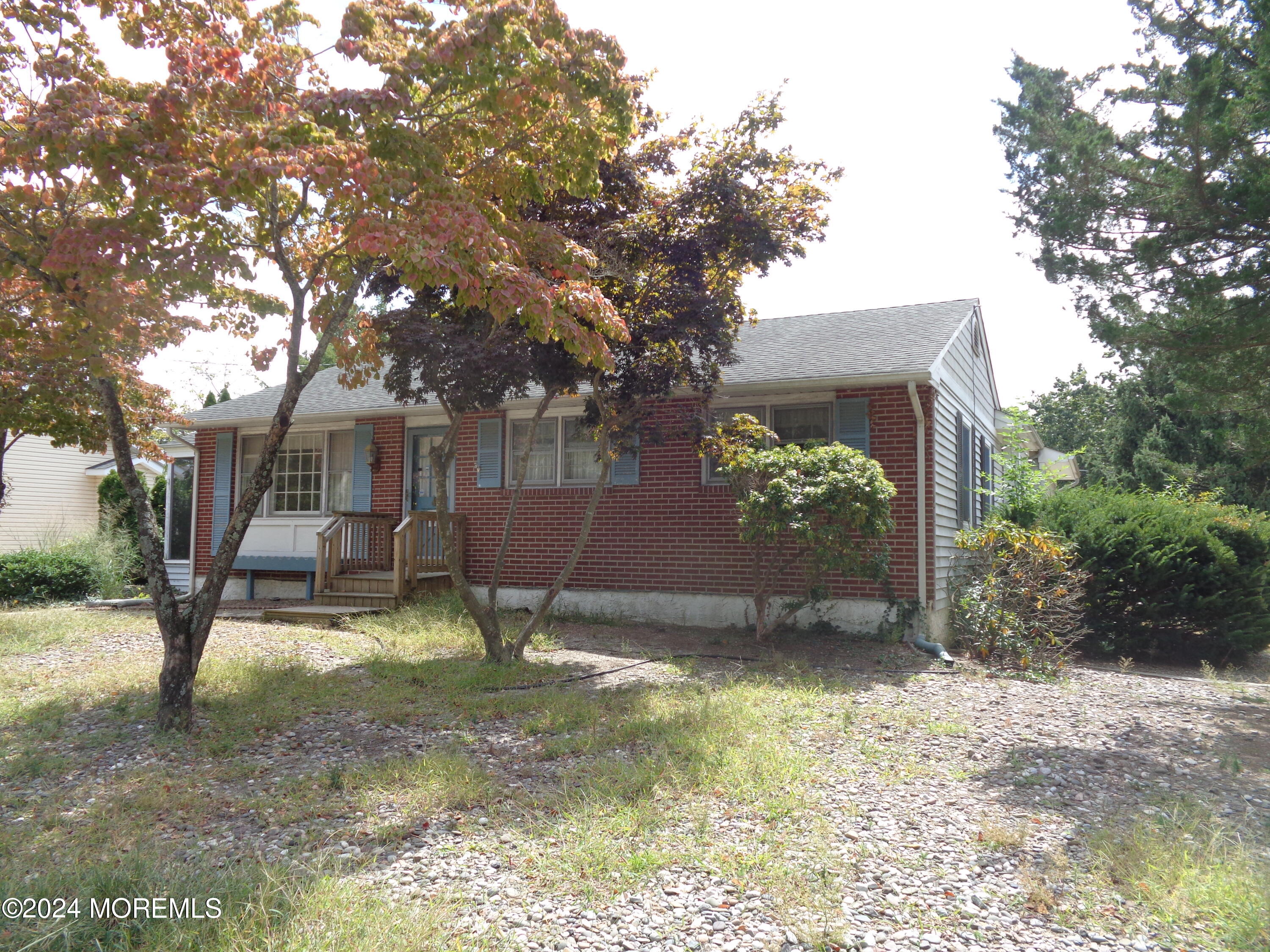 401 Springfield Avenue Pine Beach, NJ 08741 - Photo 2 of 24 a view of a house with backyard and a tree