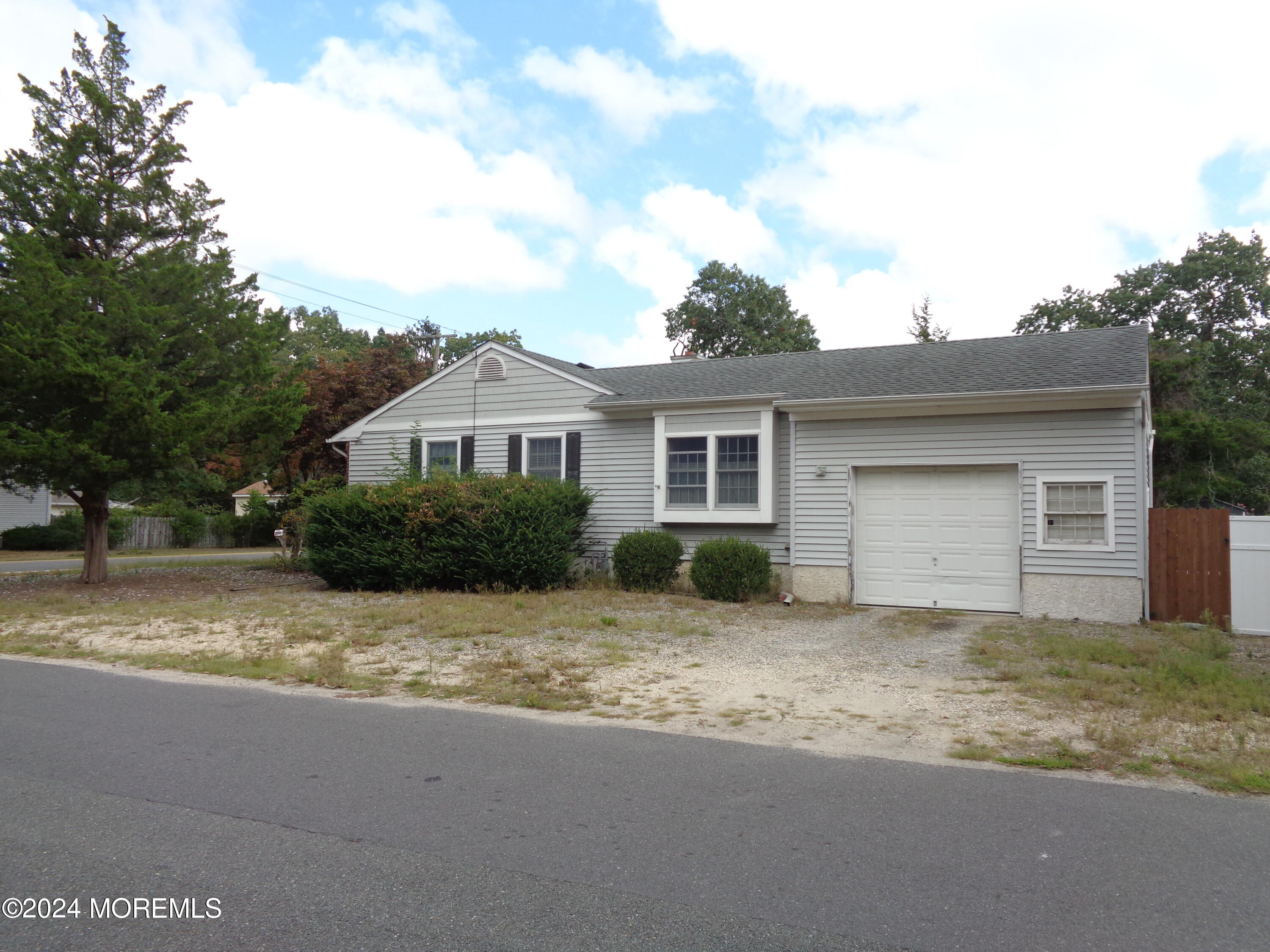 401 Springfield Avenue Pine Beach, NJ 08741 - Photo 3 of 24 a view of a house with a yard