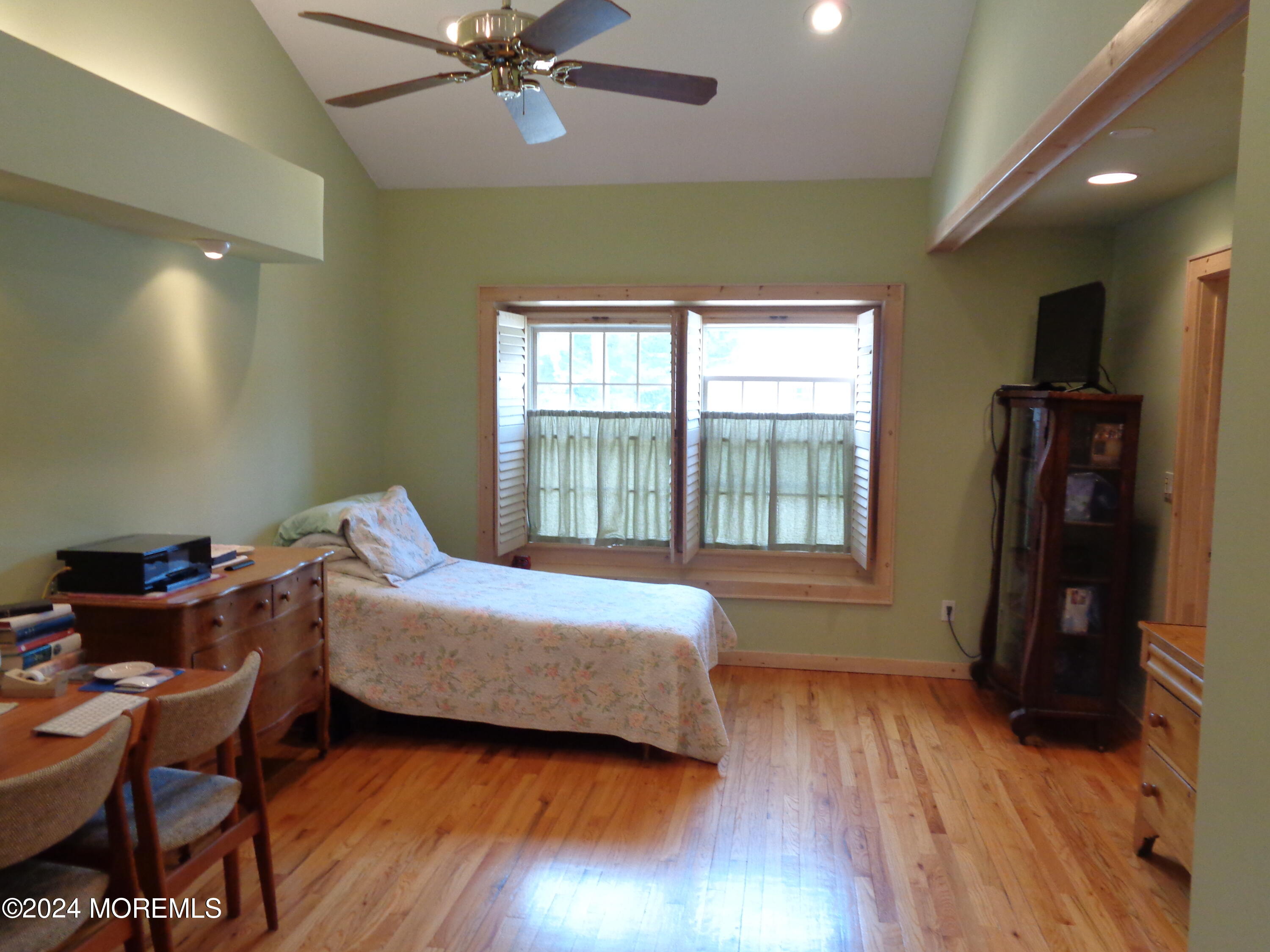 401 Springfield Avenue Pine Beach, NJ 08741 - Photo 7 of 24 a bedroom with a bed and wooden floor
