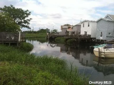 a view of a lake with houses