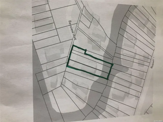 a dirty bathroom with white tiles