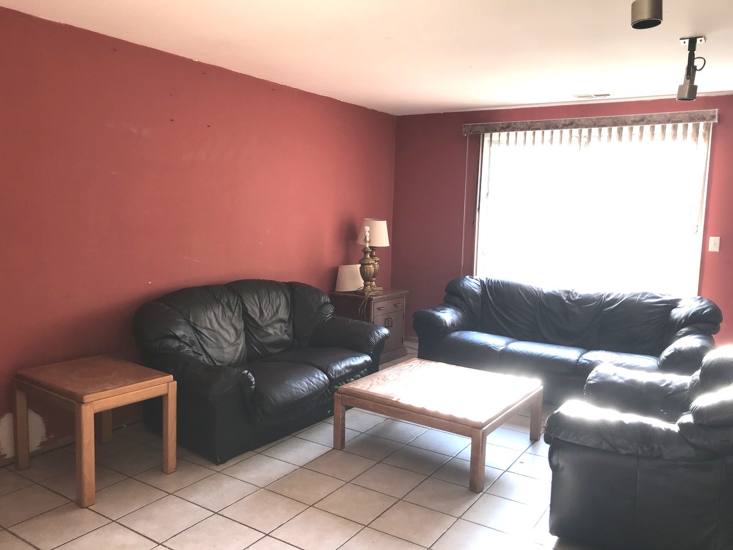54 Cloverleaf Road Matteson, IL 60443 - Photo 11 of 13 a living room with furniture and a flat screen tv