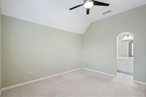 an empty room with a bathroom