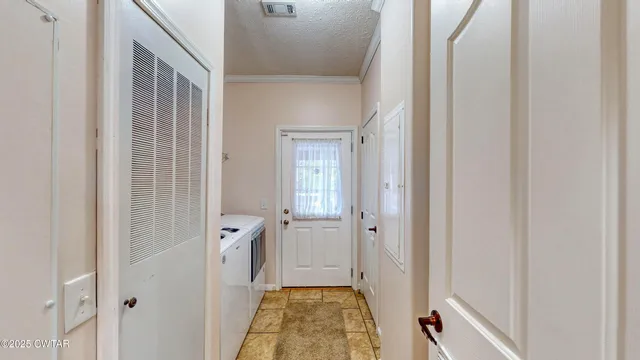 a bathroom with a tub and shower