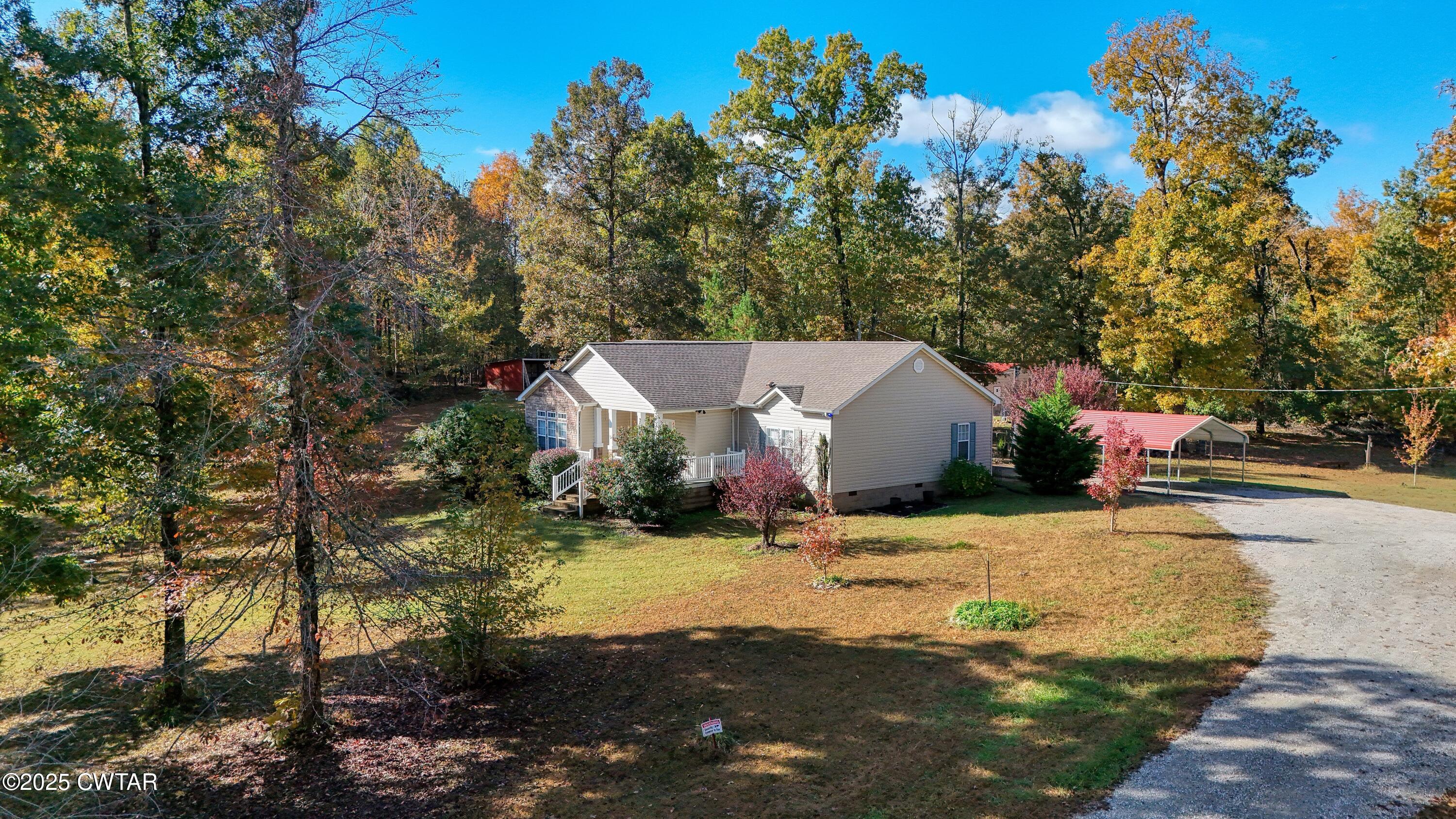 555 Brandon Road Huntingdon, TN 38344 - Photo 6 of 41 a view of a house with a yard
