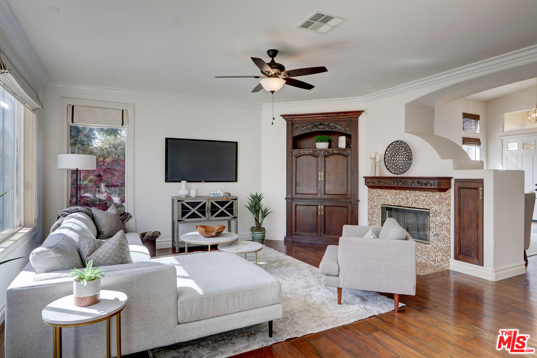 2008 Las Estrellas Court Camarillo, CA 93012 - Photo 12 of 63 a living room with furniture a fireplace and a flat screen tv