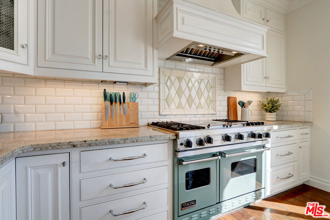 2008 Las Estrellas Court Camarillo, CA 93012 - Photo 19 of 63 a kitchen with granite countertop white cabinets and stainless steel appliances