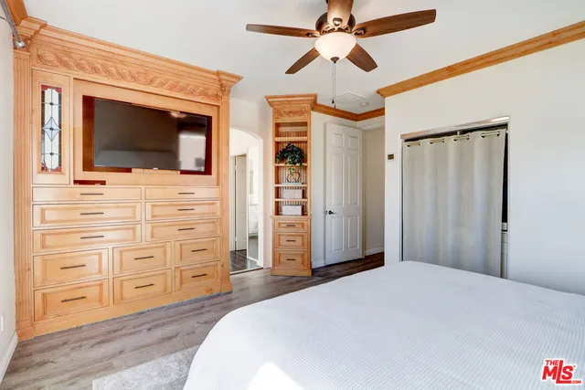a spacious bathroom with a granite countertop tub sink and mirror