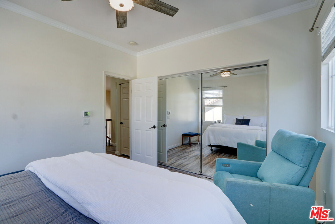 2008 Las Estrellas Court Camarillo, CA 93012 - Photo 28 of 63 a bedroom with a bed couch and window