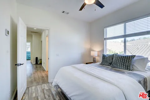 a patio with table and chairs