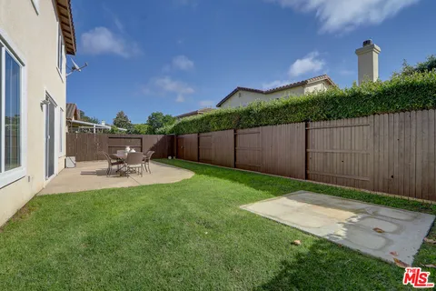 a aerial view of a house with a garden
