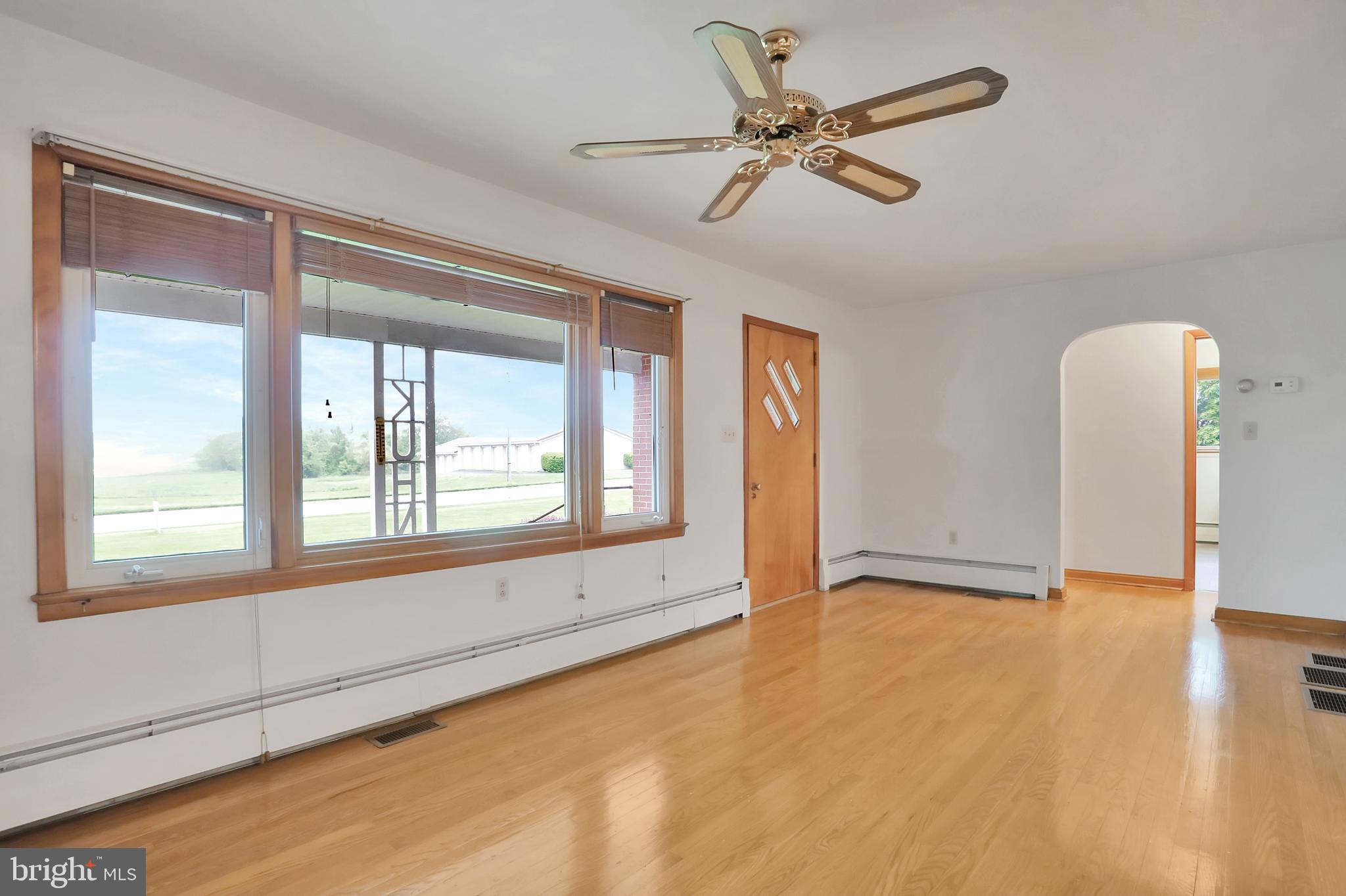 1229 Tallow Hill Road Chambersburg, PA 17202 - Photo 13 of 50 Living room with hardwood floors and ceiling fan