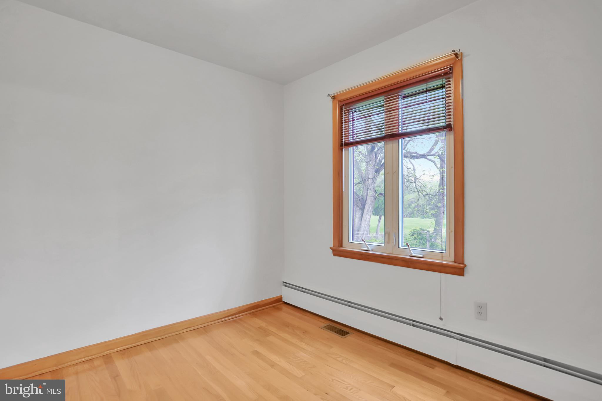 1229 Tallow Hill Road Chambersburg, PA 17202 - Photo 18 of 50 Back bedroom, hardwood flooring