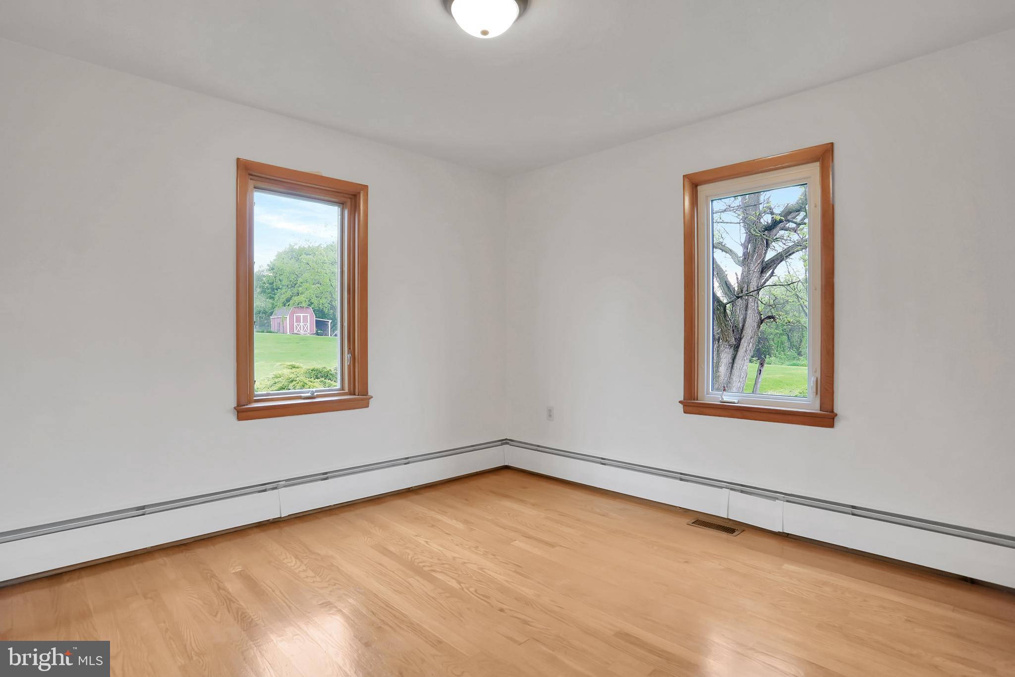 1229 Tallow Hill Road Chambersburg, PA 17202 - Photo 19 of 50 Back bedroom, hardwood flooring