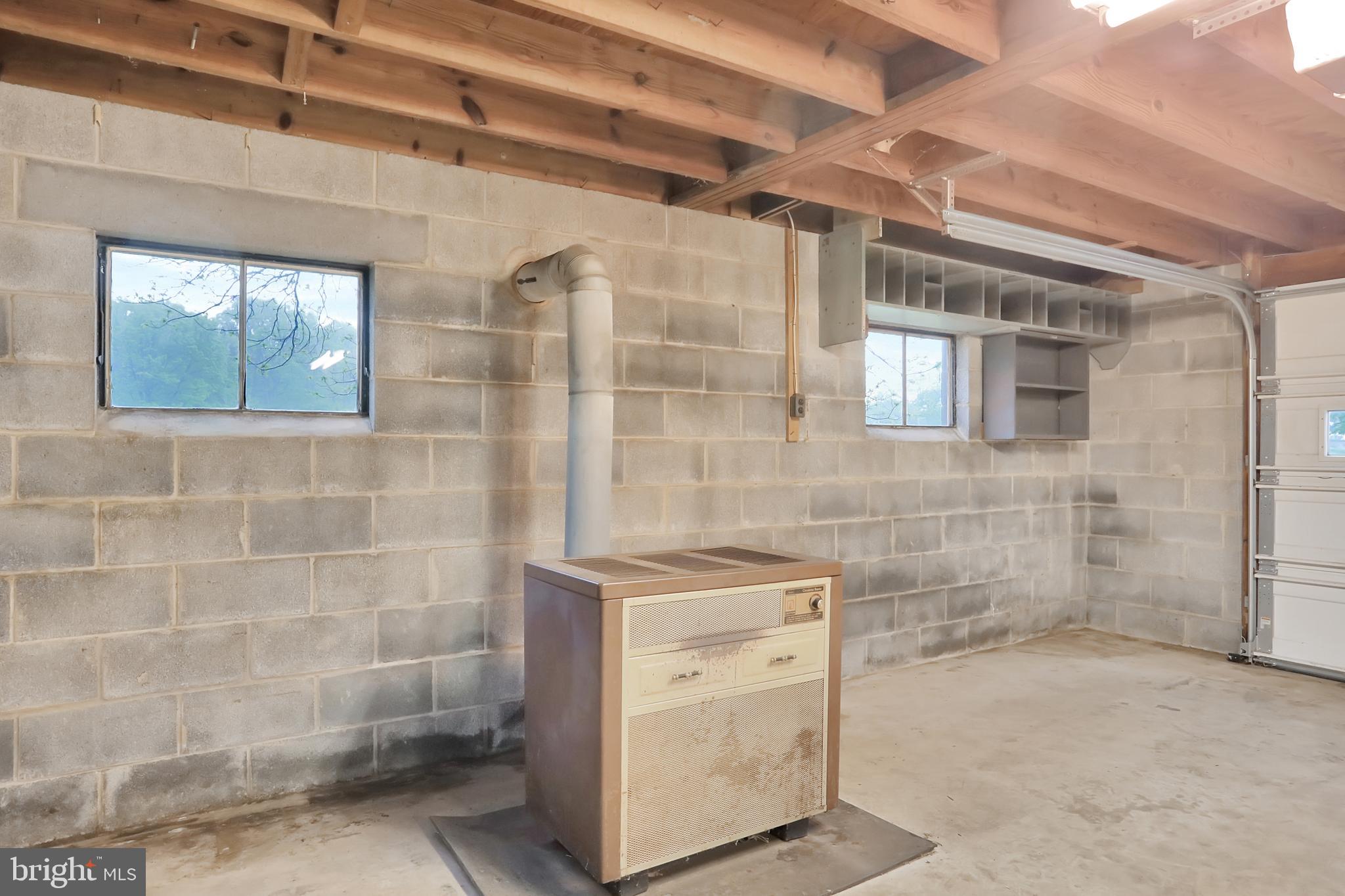 1229 Tallow Hill Road Chambersburg, PA 17202 - Photo 36 of 50 Side 2 car garage with wood burning stove