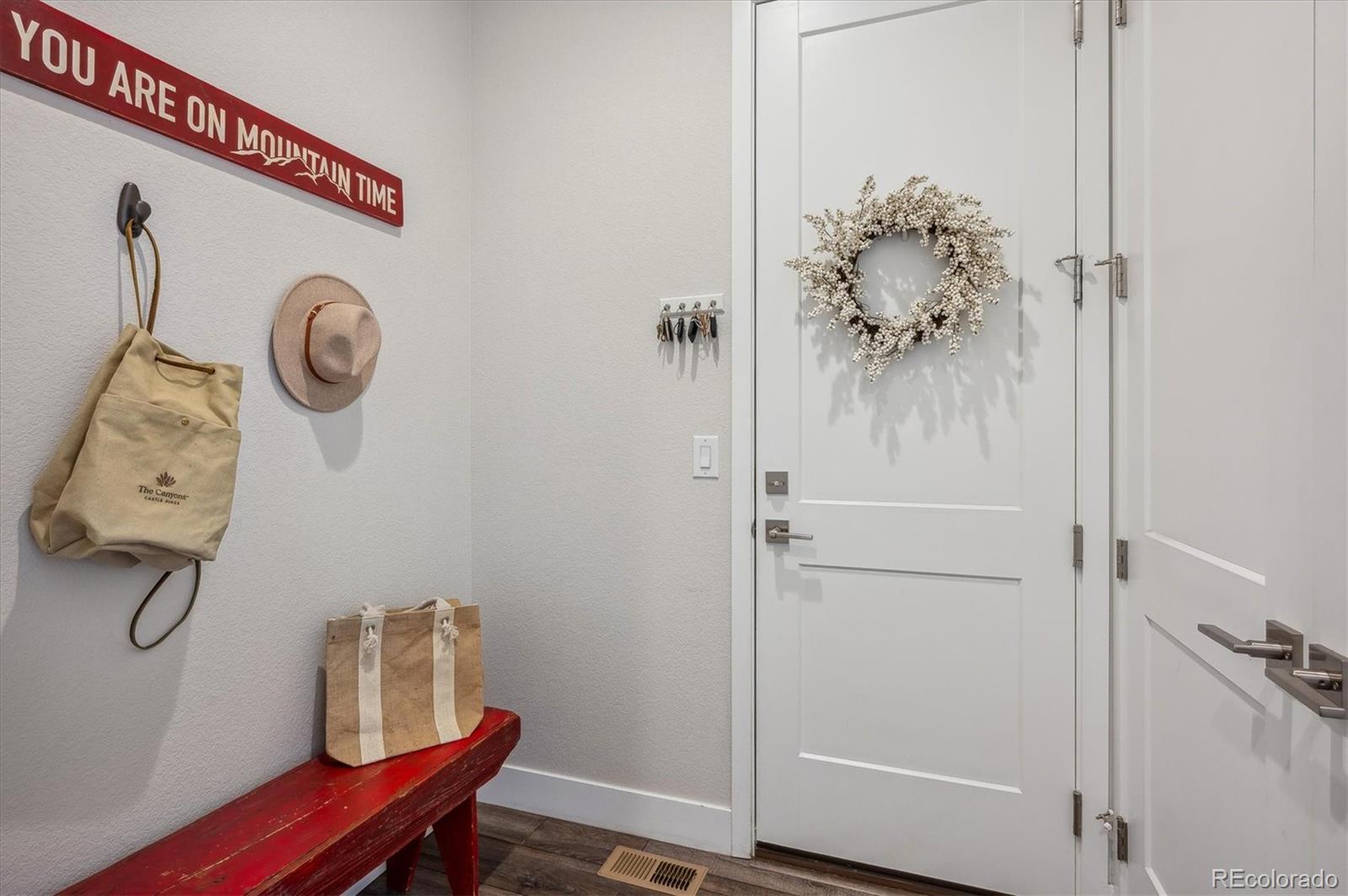 2095 Rim Ridge Drive Castle Pines, CO 80108 - Photo 27 of 46 a view of a hallway with elevator