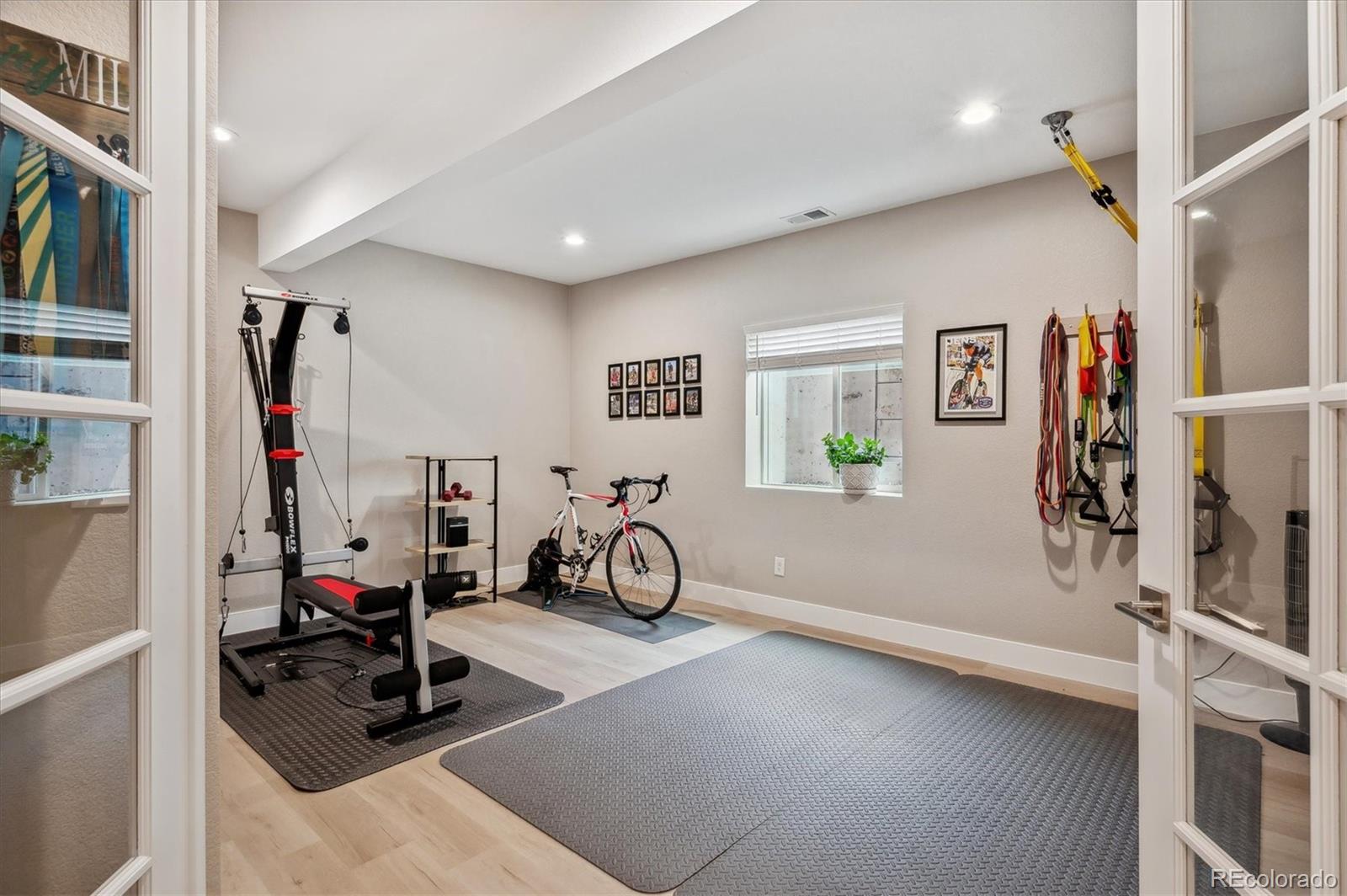 2095 Rim Ridge Drive Castle Pines, CO 80108 - Photo 33 of 46 a view of a room with gym equipment