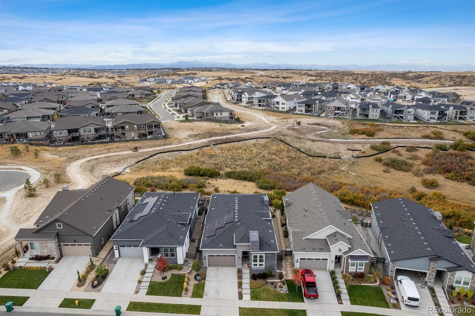 2095 Rim Ridge Drive Castle Pines, CO 80108 - Photo 4 of 46 an aerial view of residential houses with outdoor space
